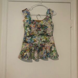 Vibrant Sleeveless Floral Peplum Blouse